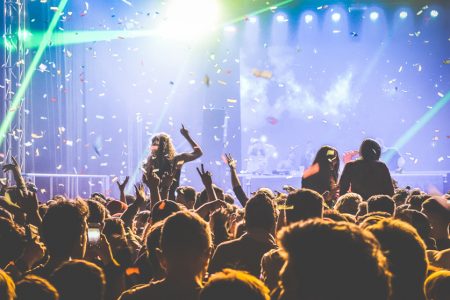 Young people dancing at night club - Hands up and multicolored confetti at nightclub after party - Nightlife concept with afterparty crowd celebrating dj concert festival event - Retro contrast filter